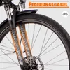 Close-up of the front suspension fork of an e-bike, with text overlay indicating 'FEDERUNGSGABEL'. Produktbild-Vorschau