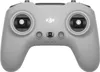 A top-down view of a gray DJI remote control for a drone, set against a white background. Voir les images du produit