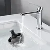 A faucet is running water into a sink where a black vacuum cleaner part is submerged. Produktbild-Vorschau