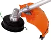 Close-up of a string trimmer head and guard. Podgląd zdjęcia produktu