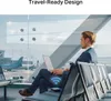 A man in a suit sits in an airport lounge using a laptop, with a wireless signal icon overlaid on his lap. Anteprima dell’immagine prodotto