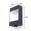 A dark gray outdoor LED wall light with a motion sensor is shown against a white background. Dimensions are indicated with arrows and text. Produktbild-Vorschau