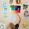 A child's hands are shown reaching for a box of colorful beads, with several finished bead creations scattered around a wooden table. Produktbild-Vorschau
