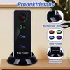 A product image showcasing a key finder device with multiple colored receivers, presented on a wooden surface with decorative elements. Produktbild-Vorschau