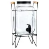A glass beverage dispenser with a black spigot and a black metal stand with wooden handles. Produktbild-Vorschau