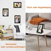 A split image showing framed photos on a wall and a framed photo on a coffee table. Produktbild-Vorschau