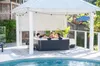People relaxing in a hot tub under a gazebo next to a swimming pool. Náhľad obrázku produktu