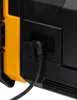 A close-up view of a black power cord plugged into a black port on a black and yellow device. Produktbild-Vorschau