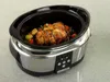 A Crockpot slow cooker filled with a roast and vegetables. Produktbild-Vorschau