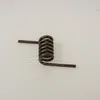 A metal spring with two straight arms, shown against a plain white background. Produktbild-Vorschau
