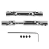 Two metal drive shafts and a set of small black accessories are laid out on a white background. Náhled obrázku produktu