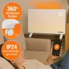 A person is relaxing on a couch while using a smartphone to control a white electric heater in the background. The heater has a digital display showing '23'. There are also circular overlays on the left highlighting features like '360° drehbare Rollen' (36 Voir les images du produit