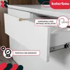 Close-up of a white cabinet drawer with a gold handle, showing its opening mechanism and labels indicating installation options and features. Produktbild-Vorschau