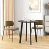 A round dining table with two chairs in a room with light curtains and a framed picture on the wall. Produktbild-Vorschau