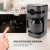 Close-up of a gray coffee maker with a digital display and a hand interacting with the control panel, alongside descriptive text. Produktbild-Vorschau