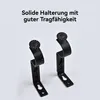 Two black curtain rod brackets are shown against a light gray and white background. Text is overlaid at the top. Produktbild-Vorschau