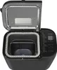 A black Panasonic bread maker with its lid open, showing the interior. Podgląd zdjęcia produktu