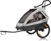 A child trailer for bicycles and strollers, shown from a side-angle on a white background. Produktbild-Vorschau