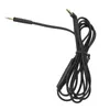 A black headphone cable with two 3.5mm jacks and an inline microphone/remote. Náhled obrázku produktu