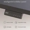 A close-up of a black desk control panel with a digital display and buttons, positioned below a grey desktop. Náhled obrázku produktu