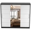 A sliding door wardrobe with a mirrored center section, reflecting a bedroom interior. Produktbild-Vorschau
