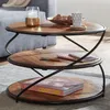 Runder Couchtisch Sheesham mit drei Ablageflächen und schwarzem Metallgestell in Gesamtansicht. Voir les images du produit