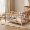 Ein Puppenbett aus Holz in einer natürlichen Farbe mit Produktbild-Vorschau 8