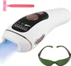 A white IPL hair removal device with a digital display, along with a pink razor and green protective glasses, is shown against a white background. Podgląd zdjęcia produktu
