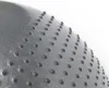 Close-up of the textured surface of a gray exercise ball with small raised bumps. Náhled obrázku produktu