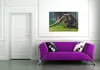 Wallario Premium Leinwandbild Sitzender Orang-Utan im Gras Produktbild-Vorschau 3
