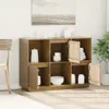A wooden sideboard with multiple compartments, some open and some with doors, displaying kitchenware and decorative items. The sideboard is placed in a room with a chair and a plant visible. Náhled obrázku produktu