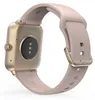 The back view of a smartwatch with a pink strap and gold casing. Náhled obrázku produktu
