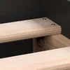 A close-up view of wooden slats and metal screws, likely part of a bed frame assembly. Podgląd zdjęcia produktu