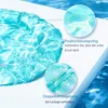 A close-up of a blue and white patterned cooling mat with text callouts highlighting features. Produktbild-Vorschau