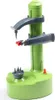 A green electric fruit and vegetable peeler on a white background. Produktbild-Vorschau