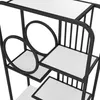 A close-up view of a modern, multi-tiered shelf unit with a black metal frame and white shelves. The shelves are arranged in a staggered pattern, and the left side features decorative circular cutouts. Produktbild-Vorschau