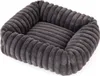 A close-up, studio shot of a gray, plush dog bed with a ribbed texture. Produktbild-Vorschau