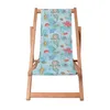 A wooden deck chair with a fabric seat featuring a mermaid and underwater creature print. Produktbild-Vorschau