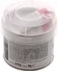 A close-up view of a white plastic container with a clear lid, showing product information and contents. Anteprima dell’immagine prodotto