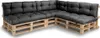 A sectional sofa made from wooden pallets with dark gray cushions. Náhled obrázku produktu
