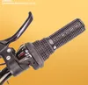 A close-up view of a bicycle's handlebar grip and gear shifter. Produktbild-Vorschau