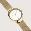 A close-up studio shot of a gold Bering watch with a white face and diamond markers, against a plain white background. Produktbild-Vorschau