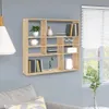 A wooden wall shelf filled with decorative items and books, mounted on a gray wall next to a window with blinds. Anteprima dell’immagine prodotto