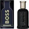 A bottle of Hugo Boss Bottled Triumph Elixir EDP and its packaging are displayed side-by-side on a white background. Náhled obrázku produktu