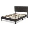 A dark gray upholstered bed frame with a tufted headboard and wooden slats for mattress support, shown against a white background. Náhled obrázku produktu