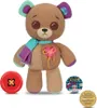 A plush teddy bear with colorful accents and accessories. Podgląd zdjęcia produktu