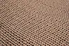 A close-up, textured view of corrugated cardboard. Voir les images du produit