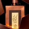 A close-up shot of a perfume bottle with a copper-colored body and a gold label with Arabic script and English text. Anteprima dell’immagine prodotto