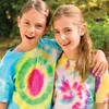 Two young girls smiling and posing with their arms around each other, wearing tie-dye t-shirts. Produktbild-Vorschau