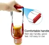 A hand holding a jar lifter to remove a jar from a pot. Produktbild-Vorschau